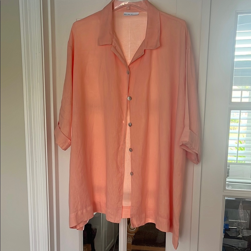 Peach colored linen, big shirt.